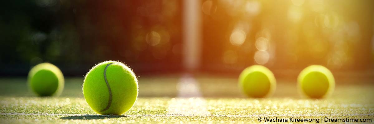Scott Colebourne Joins Tennis Resorts Online--photo of tennis balls on court